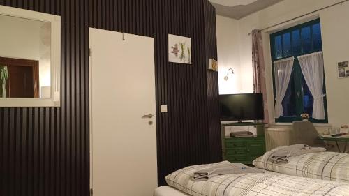 Кровать или кровати в номере Hotel Villa Alice