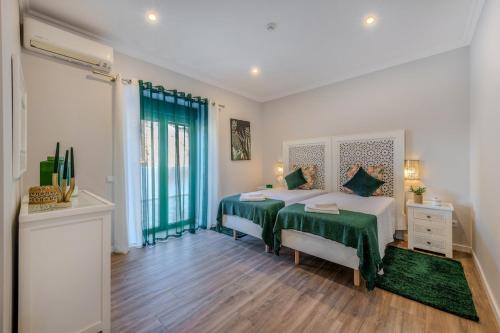 Ένα ή περισσότερα κρεβάτια σε δωμάτιο στο Quinta Ribeira do Arade
