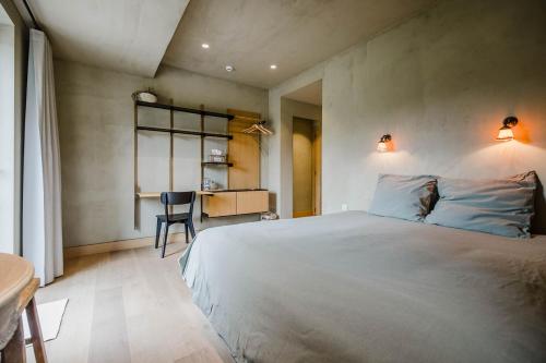 Postel nebo postele na pokoji v ubytování B&B de ZIL