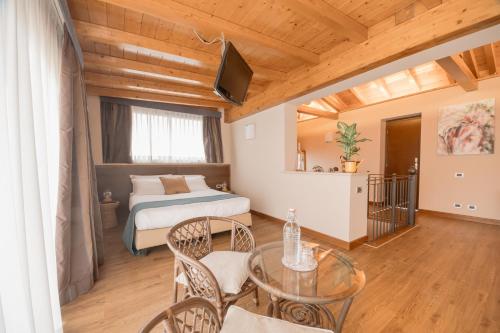 Postel nebo postele na pokoji v ubytování Green Hotel Poggio Regillo