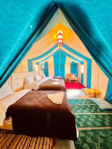 Katil atau katil-katil dalam bilik di Serenity Sky Luxury Camp
