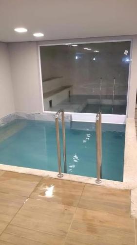 Kolam renang di atau dekat dengan Everest Flat Conforto, Lazer e Localização Central
