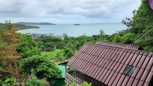 a view of the ocean from a house at Sea Views bungalow kohrong in Koh Rong Island