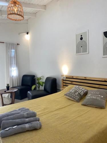 Una cama o camas en una habitación de Posada El Ceibo