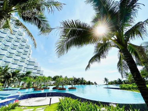 a view of the pool at the paradisus punta cana resort at Arena Cam Ranh Pearl Bay in Cam Ranh