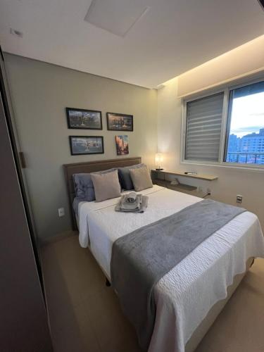 Ένα ή περισσότερα κρεβάτια σε δωμάτιο στο Sua casa com vistas no Bueno