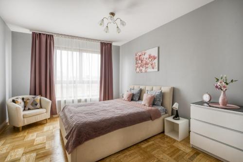 En eller flere senge i et værelse på Gama Great Location & Famili Apartment 120m 2-12 people