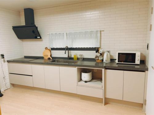 Dapur atau dapur kecil di 32평독채 포레하우스