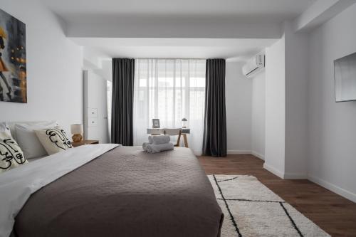 Ένα ή περισσότερα κρεβάτια σε δωμάτιο στο Pop Up ApartHotel