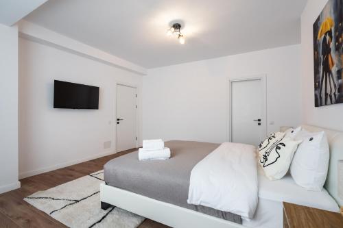 Ένα ή περισσότερα κρεβάτια σε δωμάτιο στο Pop Up ApartHotel