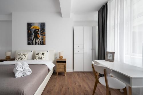 Ένα ή περισσότερα κρεβάτια σε δωμάτιο στο Pop Up ApartHotel
