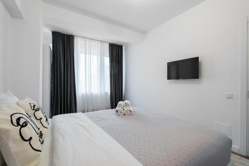 Ένα ή περισσότερα κρεβάτια σε δωμάτιο στο Pop Up ApartHotel