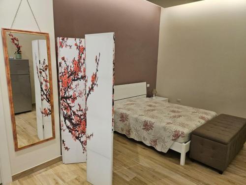 Postel nebo postele na pokoji v ubytování Casa Melograno