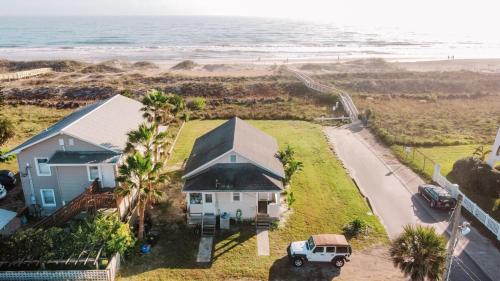 an aerial view of a house with a truck parked in front at Sun & Fun Oceanfront Saint Augustine Beach! in Saint Augustine