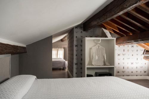 Postel nebo postele na pokoji v ubytování Maxxim Hotel & Loft
