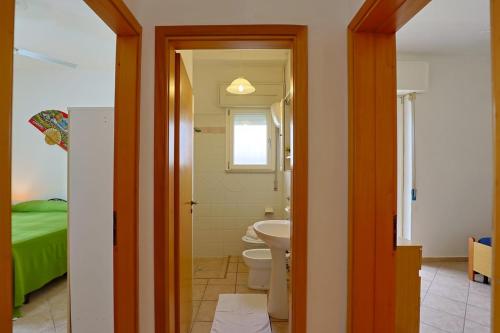 Cama o camas de una habitación en Casa Laura 2 a soli 20 mt dalla spiaggia di San Pietro in Bevagna