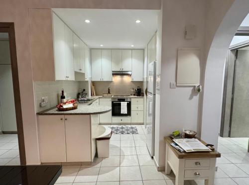 Η κουζίνα ή μικρή κουζίνα στο Olive Apartment