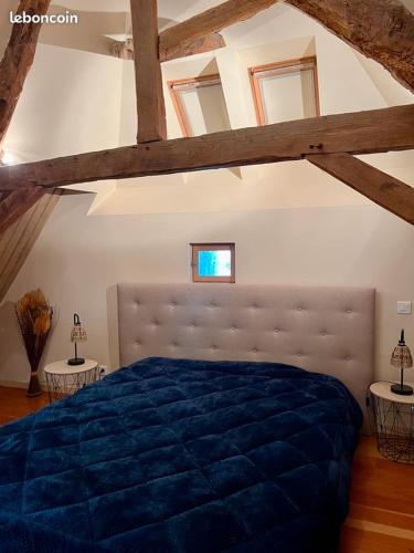 Postel nebo postele na pokoji v ubytování Gîte Hulotte