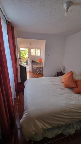 Ένα ή περισσότερα κρεβάτια σε δωμάτιο στο Brisas del Paraíso