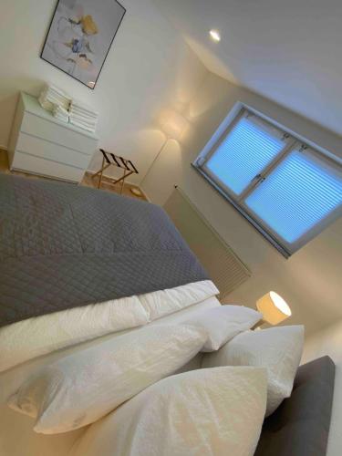 Wohnung mit Gartenblickにあるベッド