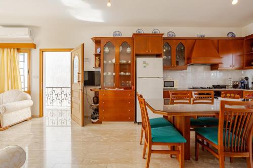 Kuchyň nebo kuchyňský kout v ubytování ARMA Resort, 2-bed Cosy Apartment