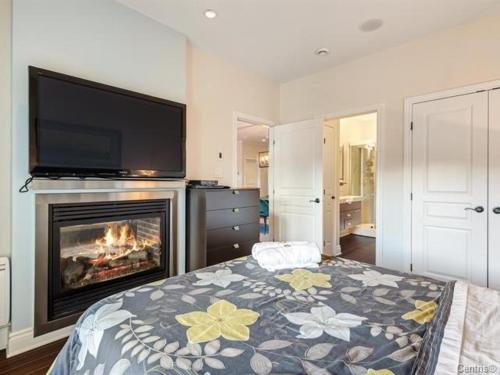 Katil atau katil-katil dalam bilik di Condo-hôtel Le Champlain - Condo103 Bromont