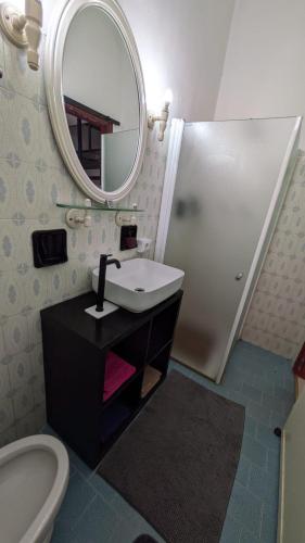 a bathroom with a sink and a mirror at A casa di Marco in Canonica d'Adda