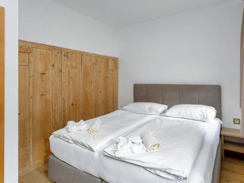 Postel nebo postele na pokoji v ubytování Gipfelblick Chalet Conny