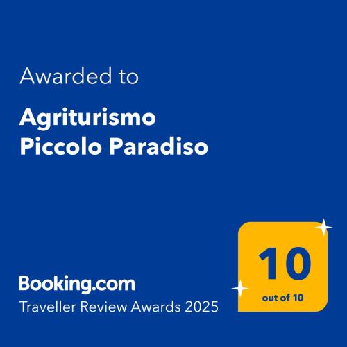 a yellow sign with the text awarded to austininigma pico parbia at Agriturismo Piccolo Paradiso in Riparbella