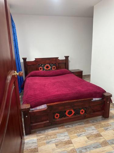 Ein Bett oder Betten in einem Zimmer der Unterkunft Hotel Milán Confort