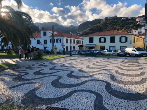 a cobblestone street with a design on the ground at Casa Dona Teresa in Santa Cruz