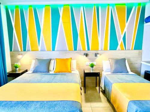 Posteľ alebo postele v izbe v ubytovaní Dori Rooms Hostal
