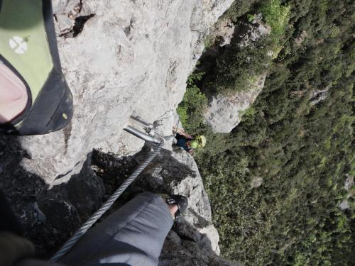 a person is standing on a rock in a canyon at Ferienwohnung Maderno in Affoltern
