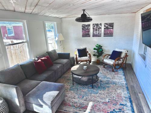 a living room with a couch and a coffee table at Pack your bags and leave tonight! in Wilmington