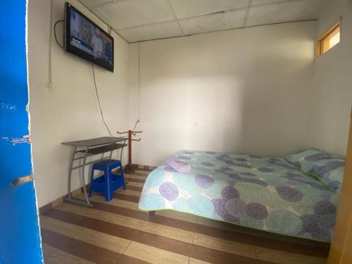 Postel nebo postele na pokoji v ubytování Divino niño