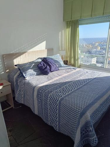 Una cama o camas en una habitación de Centro de la Peninsula, con vistas y piscina