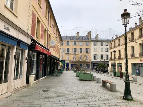 Photo de la galerie de l'établissement Au Cœur de Versailles - Appartement Élégant et Confortable, à Versailles