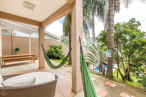 Atibaia com piscina, churrasqueira, sinuca, pingpongにある庭