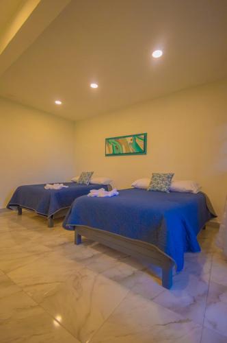Ένα ή περισσότερα κρεβάτια σε δωμάτιο στο Hotel Villa Veral