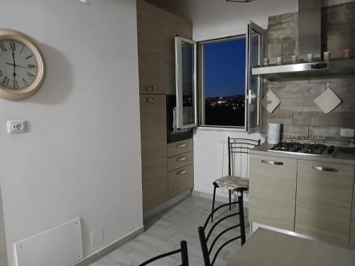Kuchyň nebo kuchyňský kout v ubytování Molly's Appartment