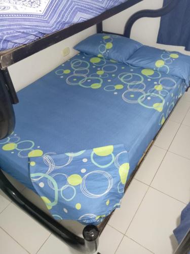 Ένα ή περισσότερα κρεβάτια σε δωμάτιο στο Squid Hostel