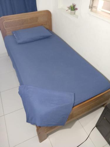Ένα ή περισσότερα κρεβάτια σε δωμάτιο στο Squid Hostel
