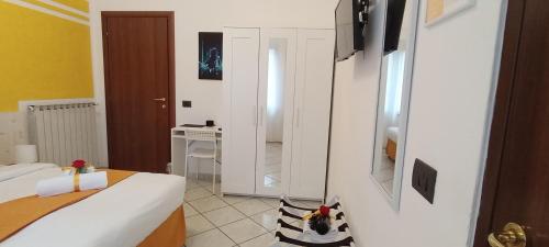 Una cama o camas en una habitación de G&G Giusy e Gabry