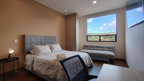 Postel nebo postele na pokoji v ubytování La Milla, Lofts