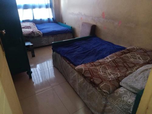 Postel nebo postele na pokoji v ubytování Sun Hostel