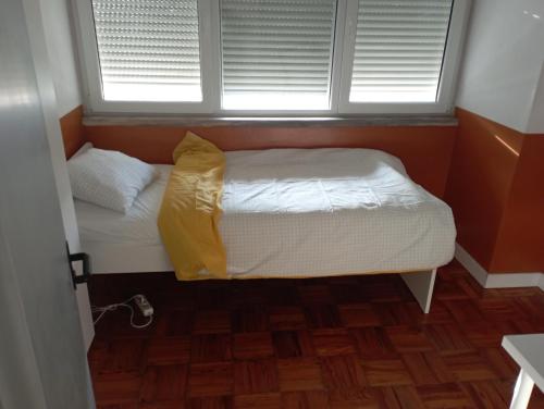 Ένα ή περισσότερα κρεβάτια σε δωμάτιο στο Home Carriche