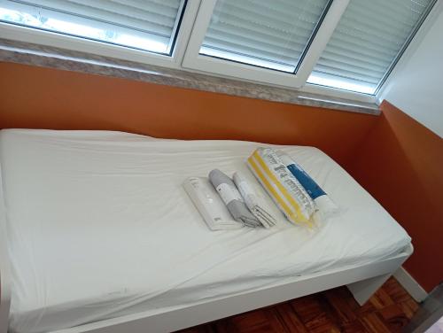 Ένα ή περισσότερα κρεβάτια σε δωμάτιο στο Home Carriche