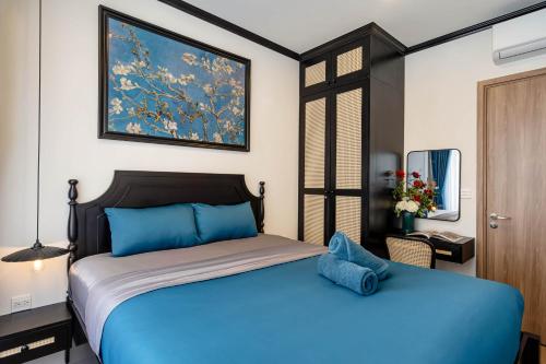 Postel nebo postele na pokoji v ubytování SOHO Residence & Hotel