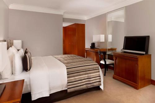 Postel nebo postele na pokoji v ubytování Hotel President Wilson, a Luxury Collection Hotel, Geneva