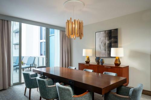 a dining room with a table and chairs at The Westin Sarasota in Sarasota